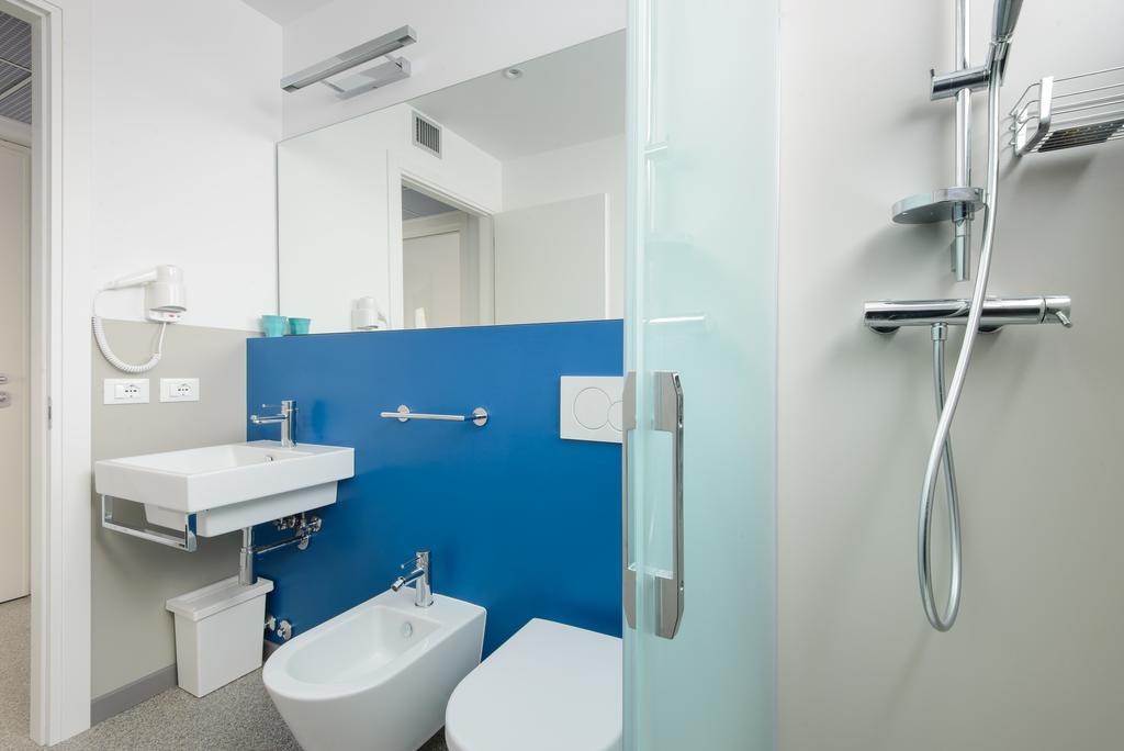 Residenza Edda Apartment Линяно Сабиадоро Стая снимка