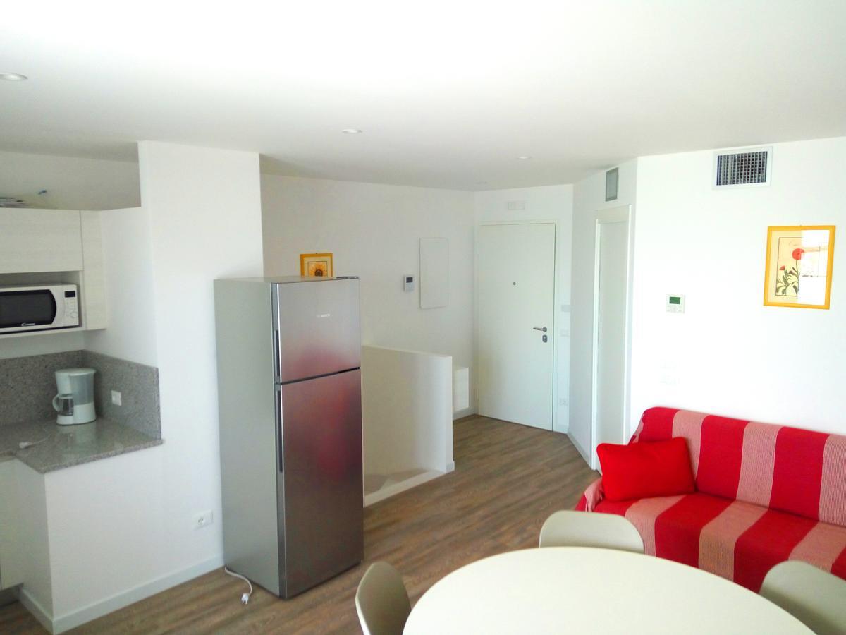 Residenza Edda Apartment Линяно Сабиадоро Екстериор снимка
