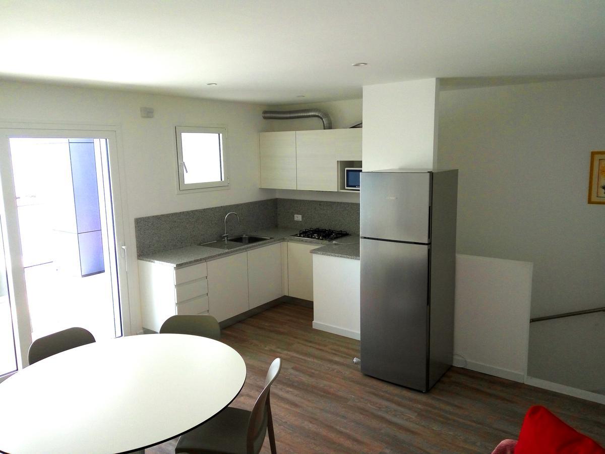 Residenza Edda Apartment Линяно Сабиадоро Екстериор снимка
